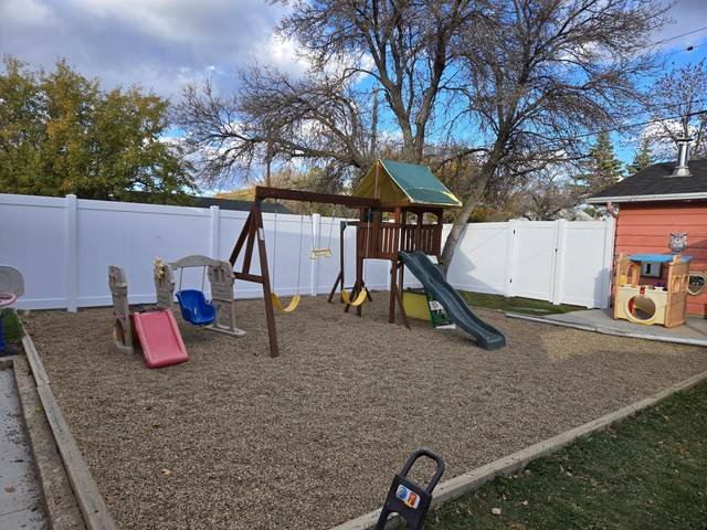 Backyard swing set & playhouse